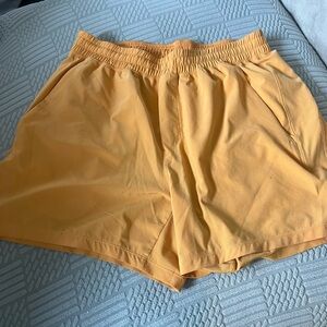 lululemon athletica orange men’s shorts